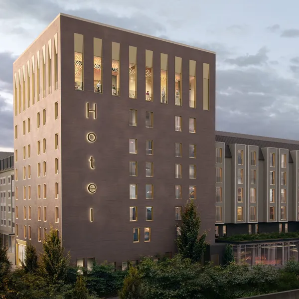 Casta Regina – Hotelensemble mit modernisiertem Altbau und markantem Neubau in warmen Farbtönen.
