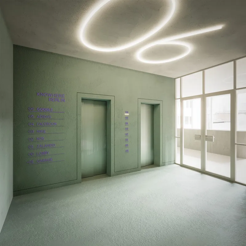 Modernes Liftlobby-Design in der Alte Jakobstraße mit integrierter Deckenbeleuchtung und minimalistischer Ästhetik.