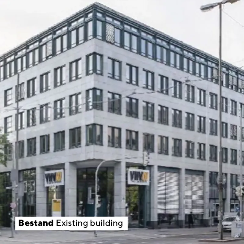 Alte Ansicht des Paul Heyse Gebäudes mit grauer Fassade und viel Glasflächen